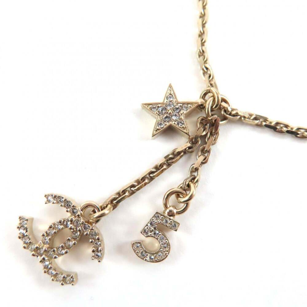CHANEL Gold Logo Necklace - Picture 7 of 9